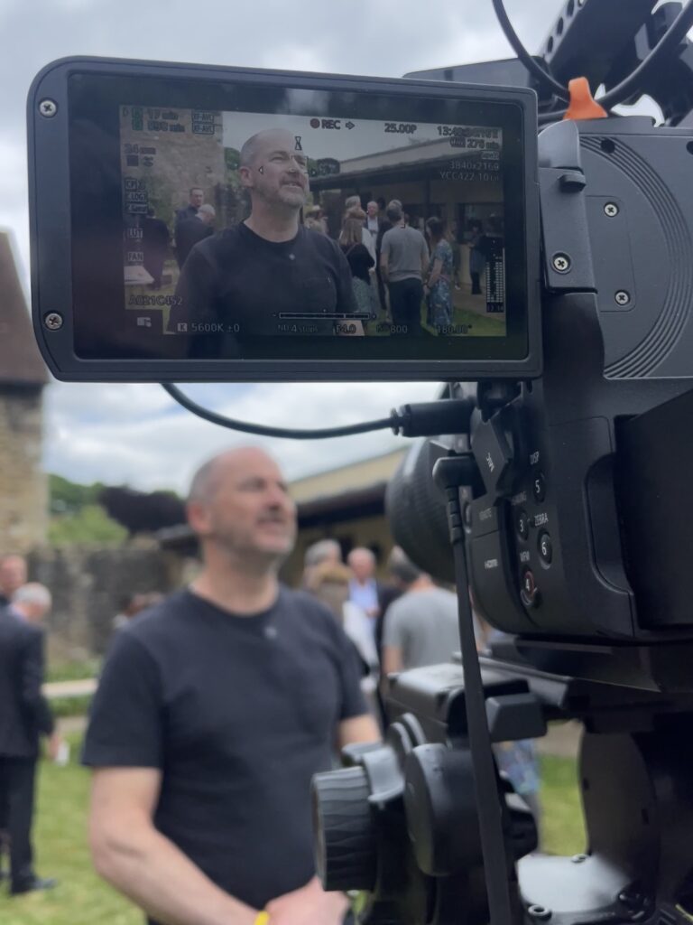 Image shows behind the camera shot of interviewing a student at St Augustine's College in Kent